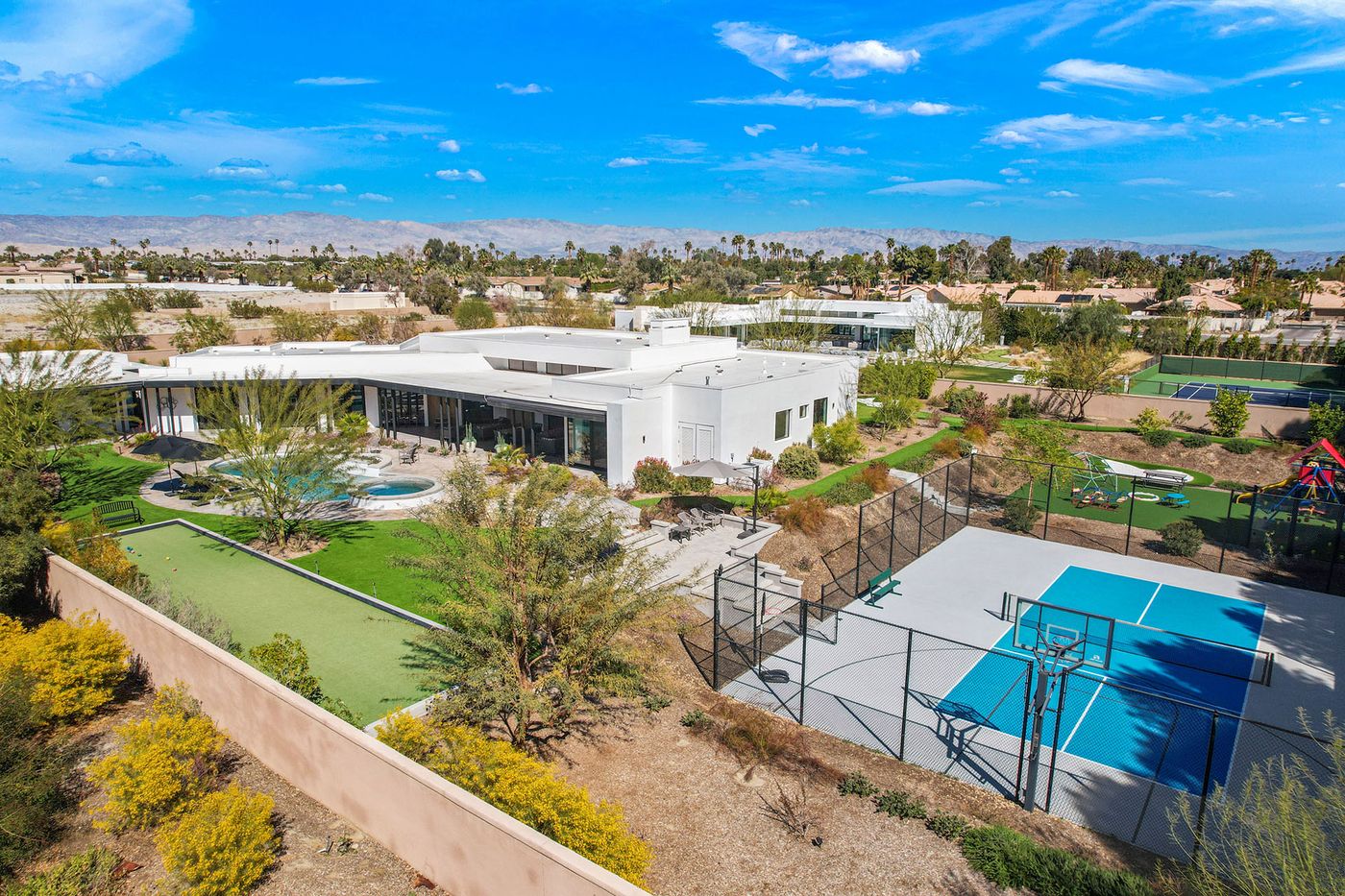 Sierra Vista's Rancho Mirage grounds with a private pickleball court, pool and outdoor recreation spaces